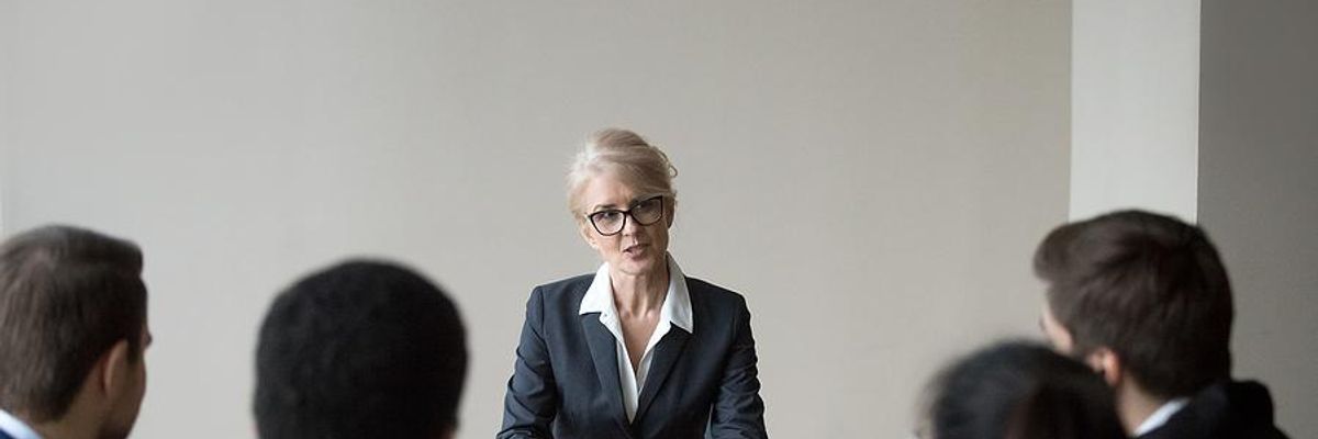 Older woman interviews for a job