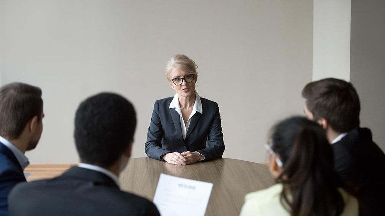 Older woman interviews for a job