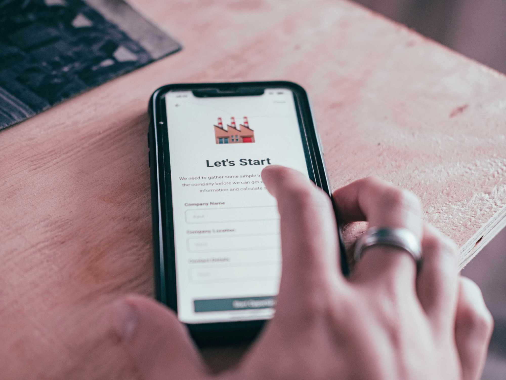 Person starts a community onboarding process on their phone