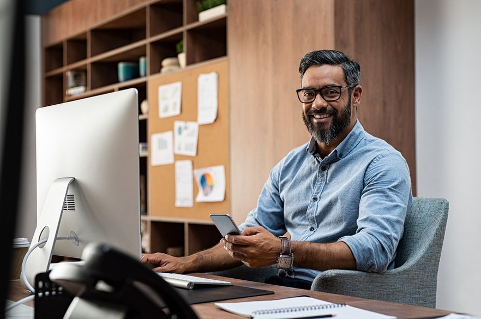 Professional man builds his online presence during his job search