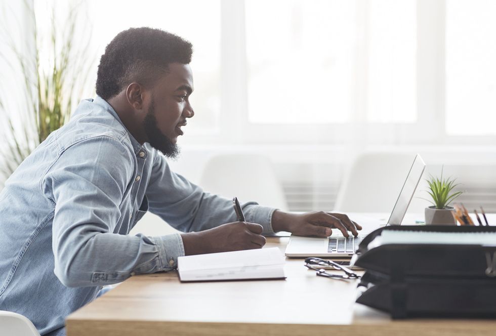 Professional man doing a gap analysis for his career development plan