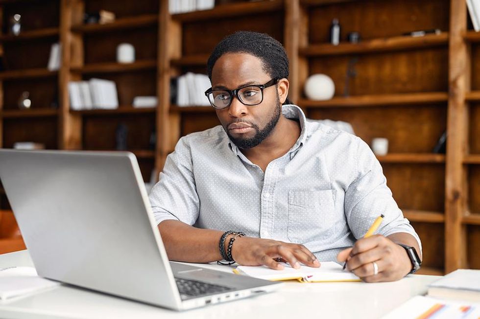 Professional man looks for a job after getting laid off