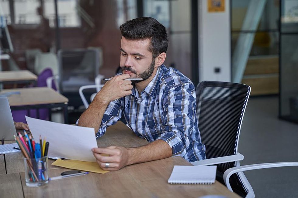 Professional man thinking about making the right career choice