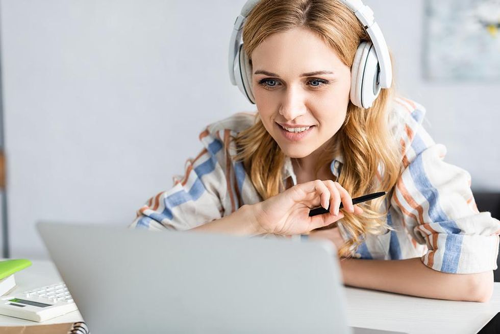 Professional takes online courses as part of her professional development goals.