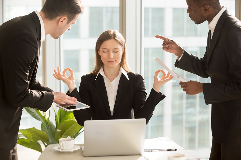 Professional woman handles workplace disagreement