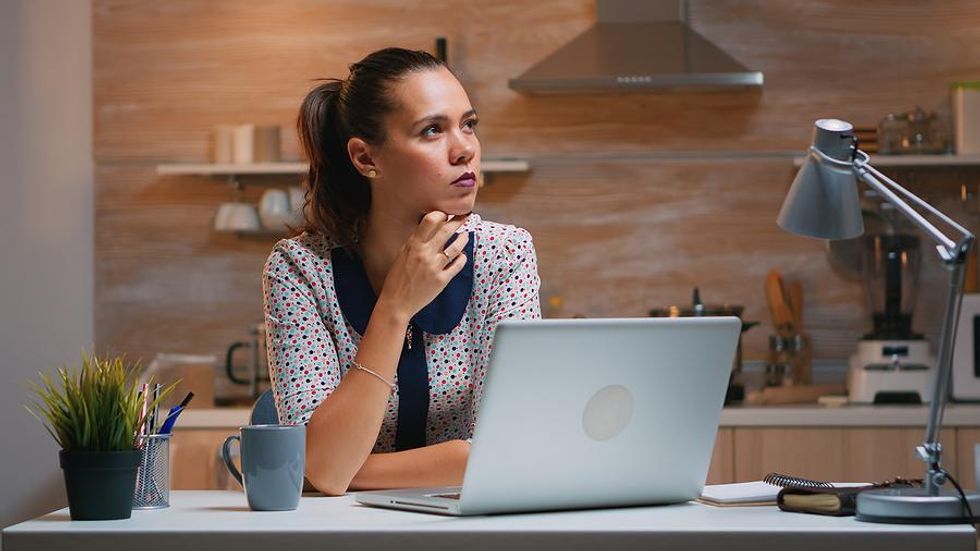 Professional woman on laptop wondering why a LinkedIn connection ghosted her