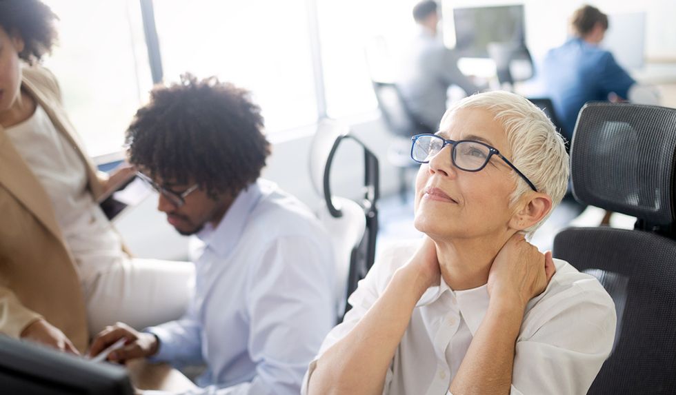 Professional woman overworked at her job