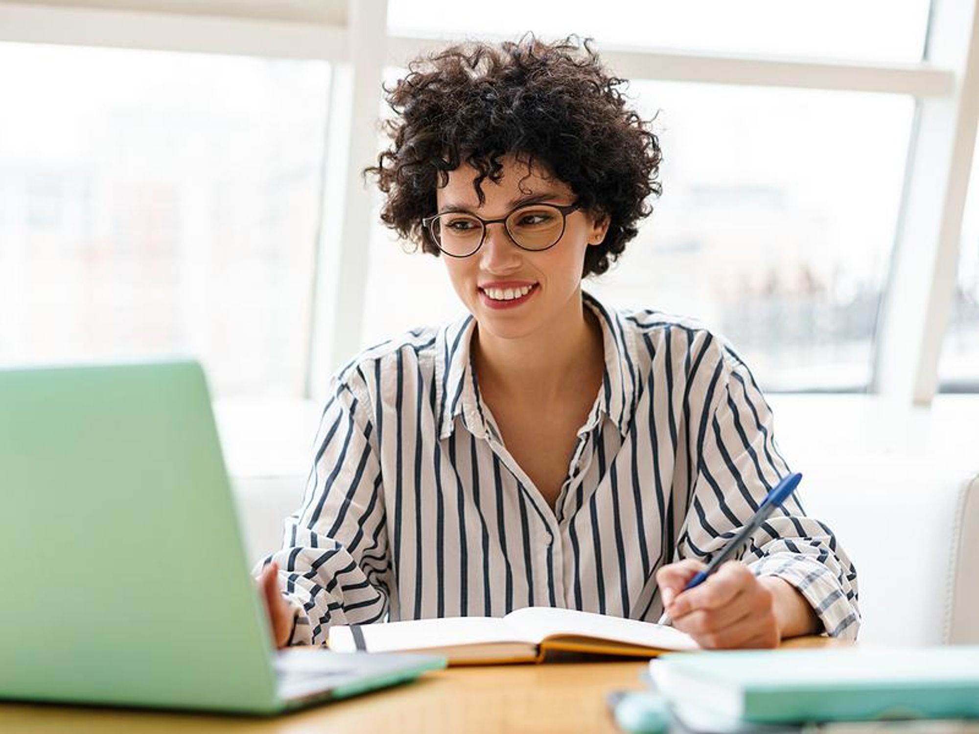 Professional woman plans her career goals for the next year