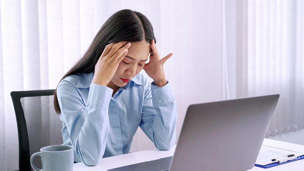 Professional woman sabotaging her career