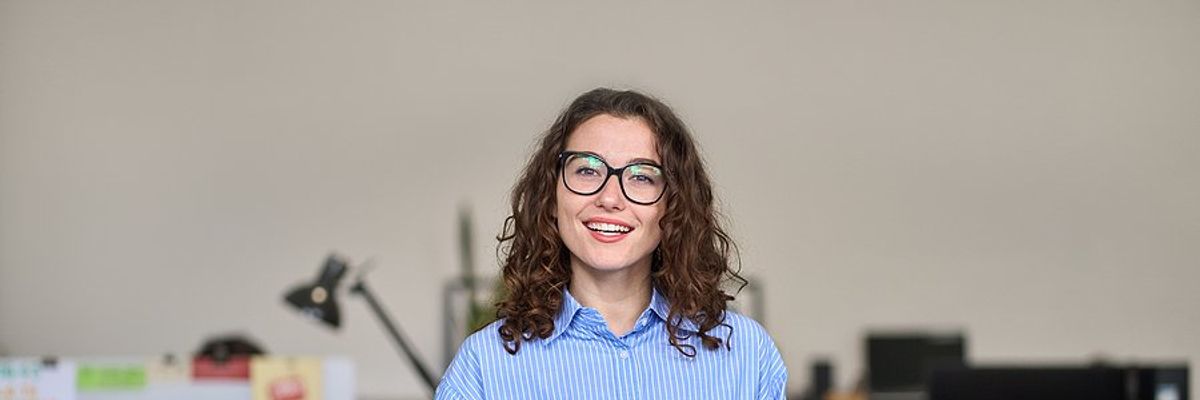 Professional woman smiling at work