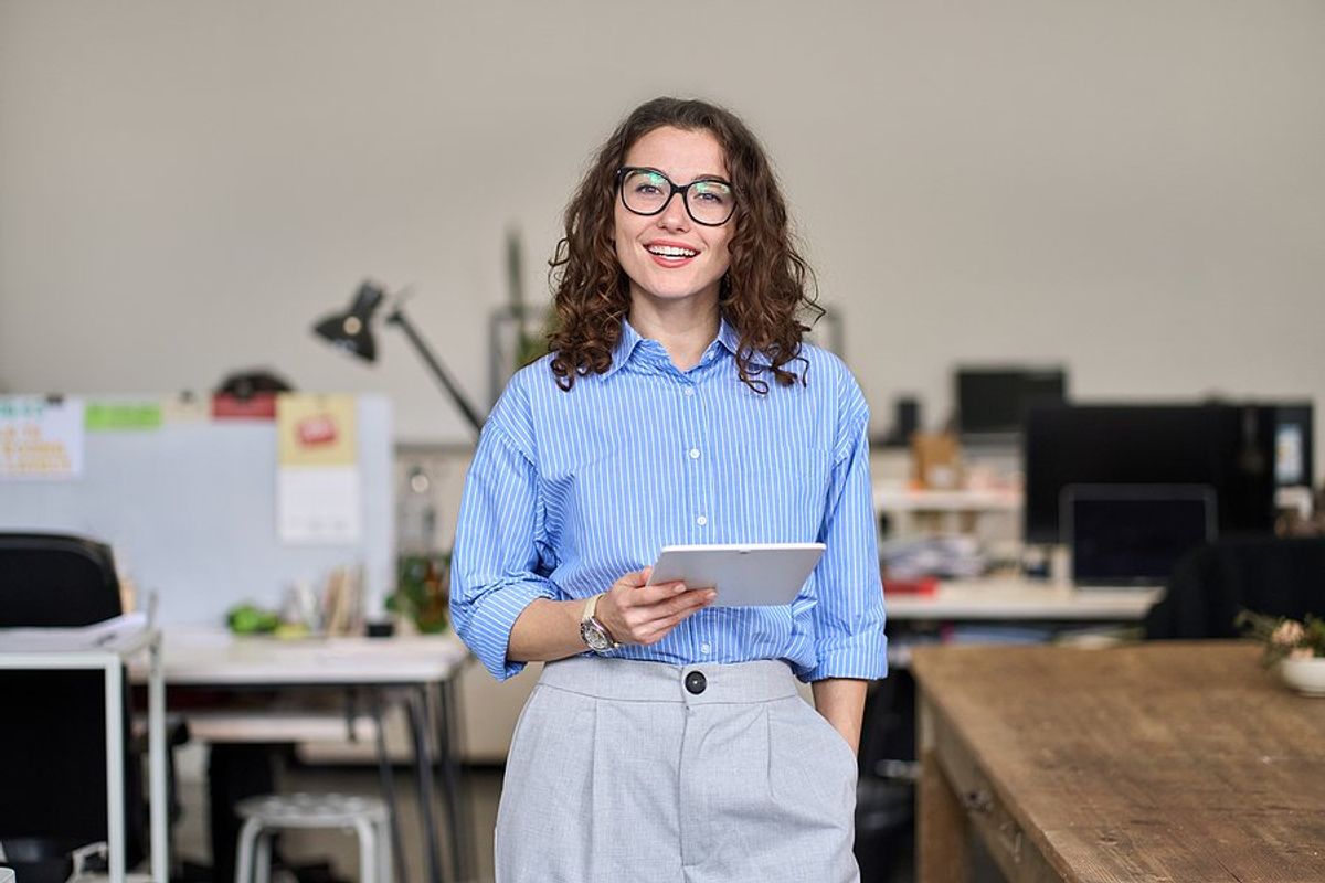 Professional woman smiling at work