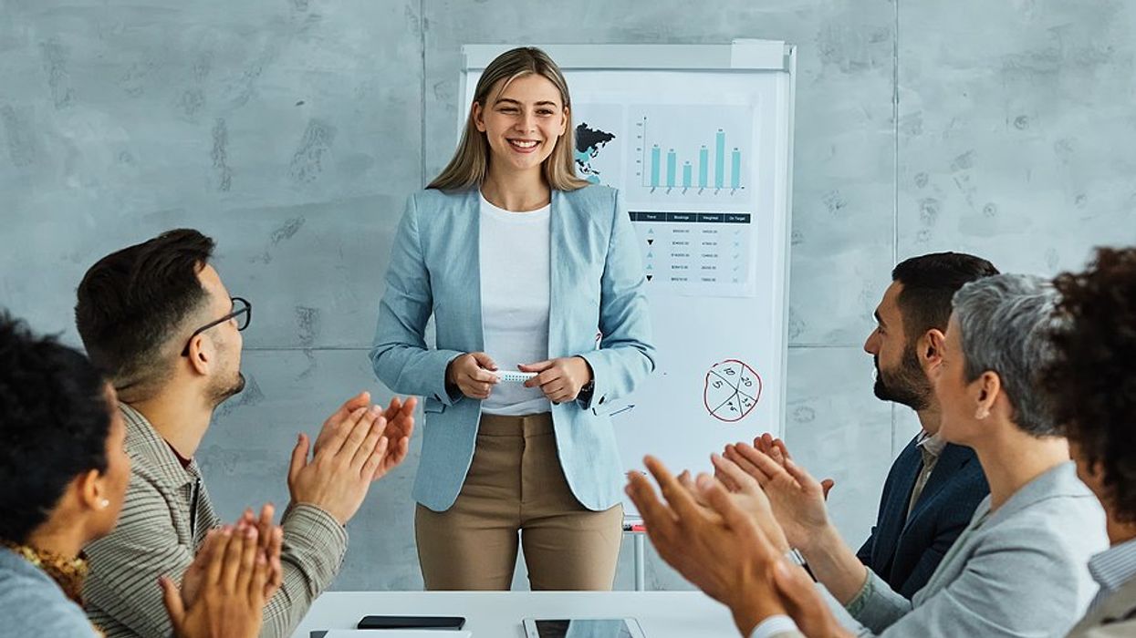 Professional woman successfully gives a persuasive presentation at work