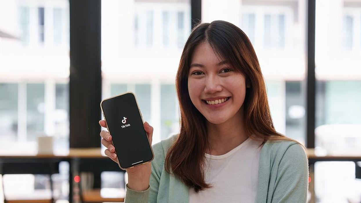 Professional woman uses TikTok in her job search