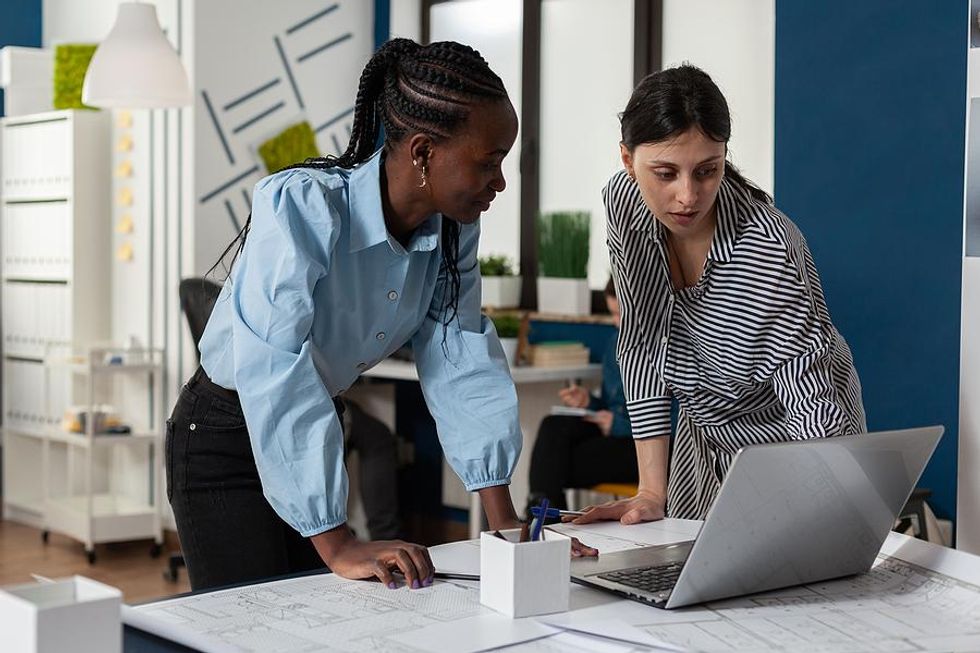 Professional women talk about an engineering project