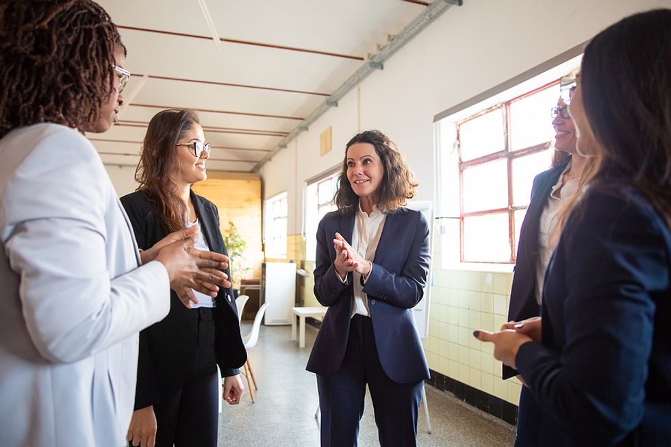 Project manager communicates with her stakeholders