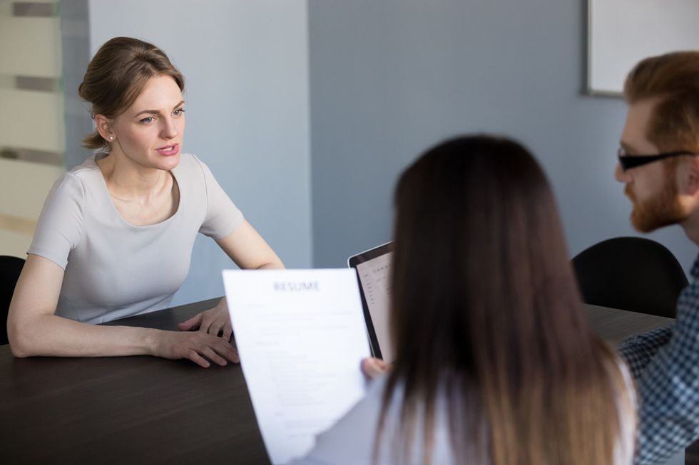 Qualified candidate talks about her skills during a marketing job interview