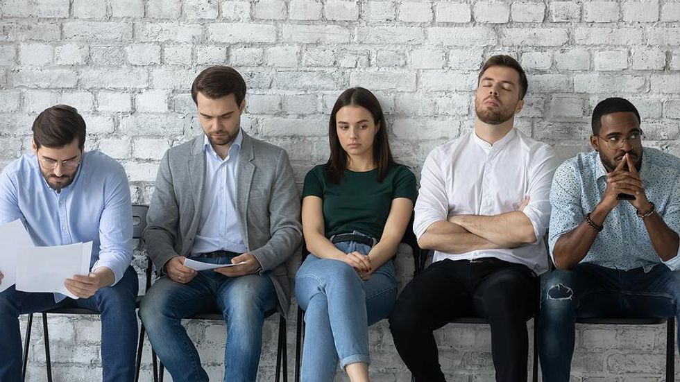 Recent college grads wait for a job interview