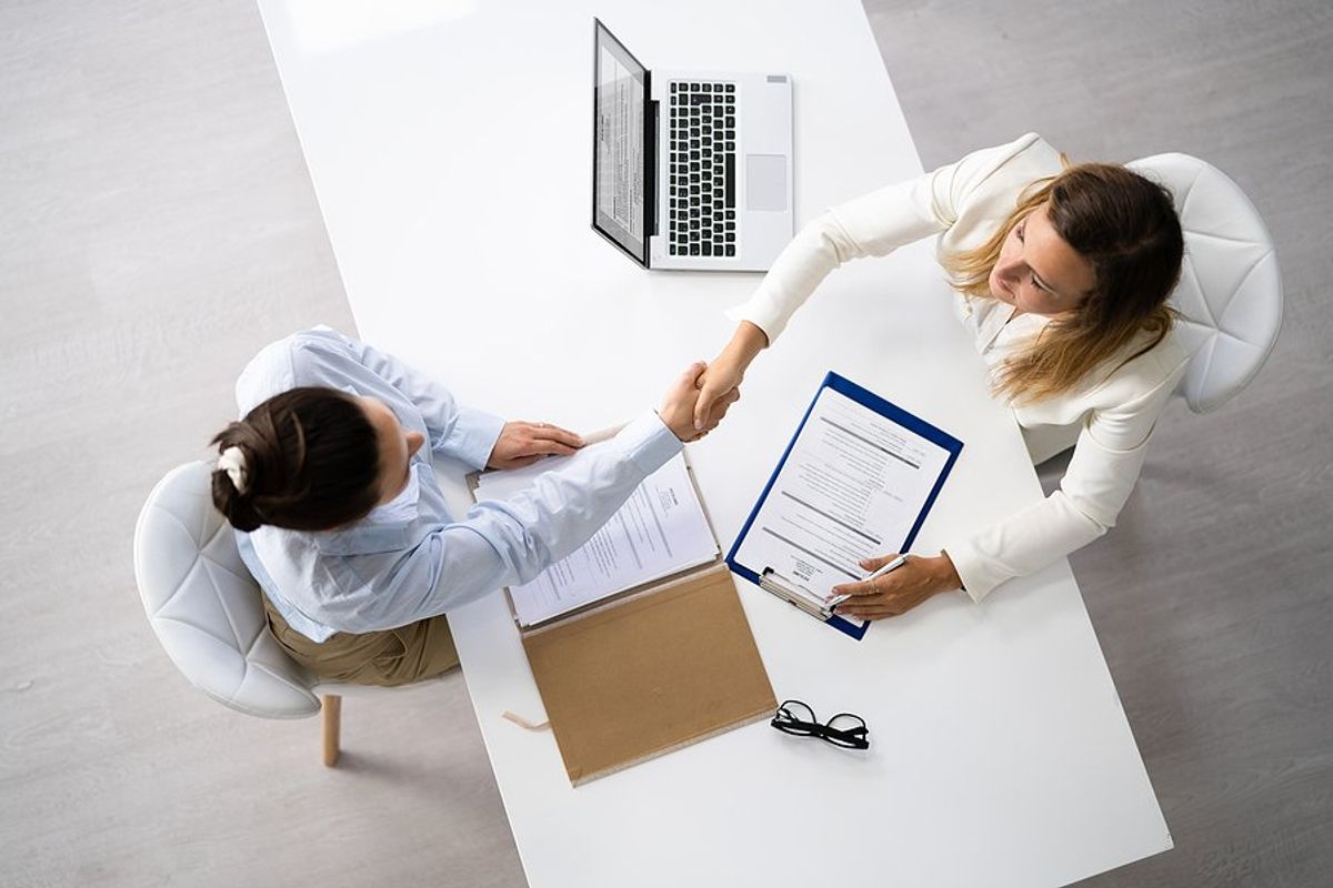 Recruiter / hiring manager talks to a job candidate