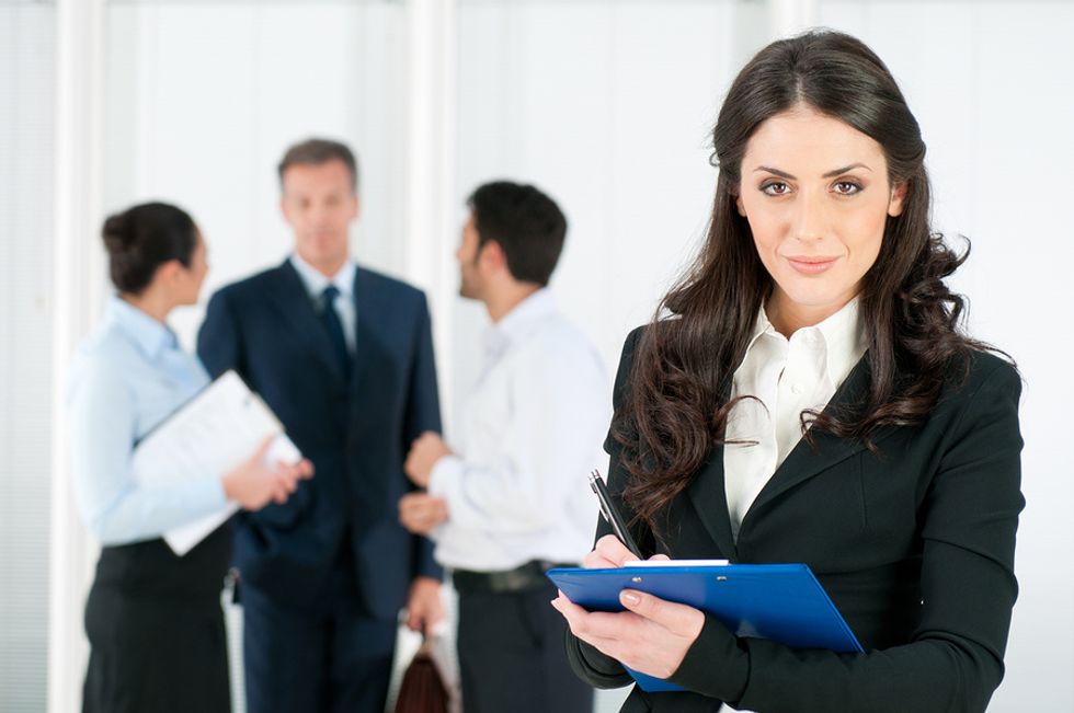 Recruiter talking to job applicants