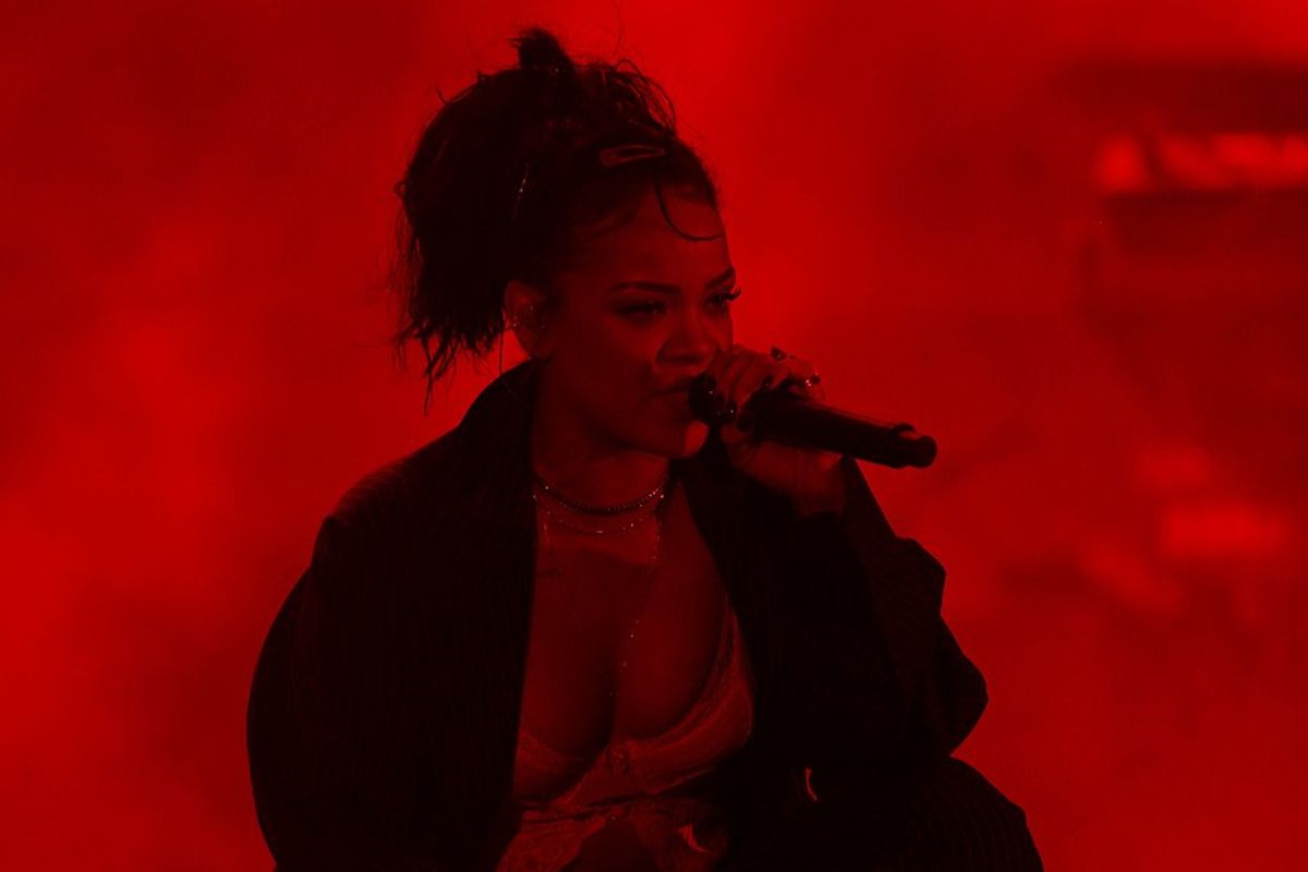 Rihanna singing at a concert