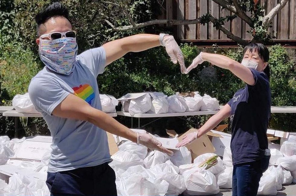 Salesforce employees work together on a community service process.