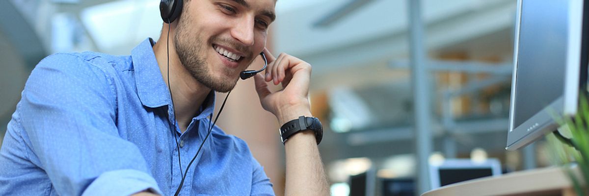 Salesman listens to a customer on the phone