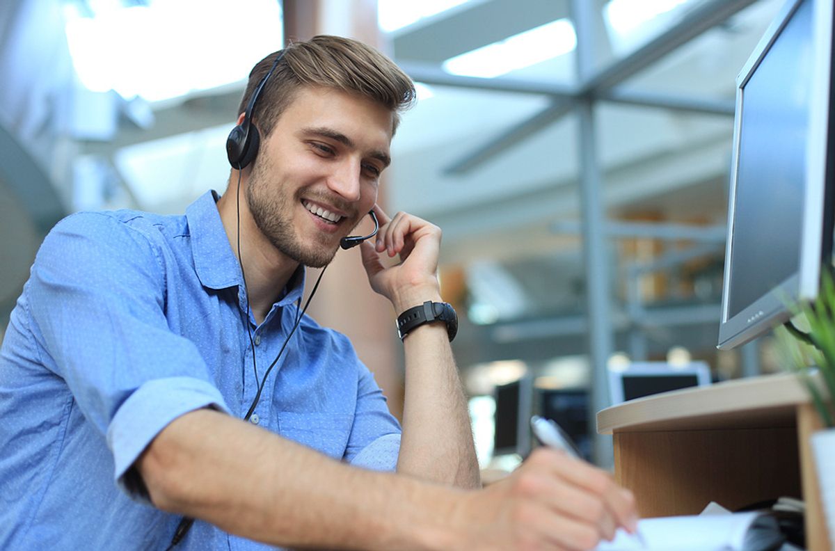 Salesman listens to a customer on the phone