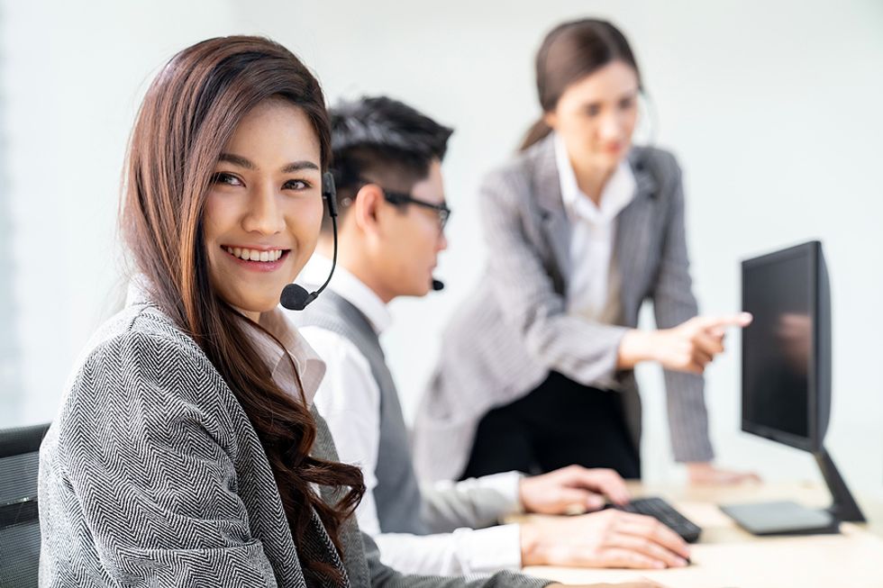 Saleswoman smiles at work
