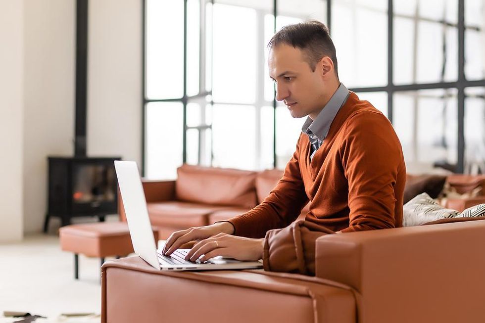Senior employee working from home