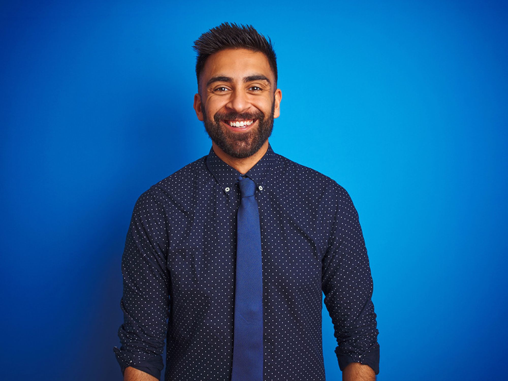 Smiling man achieves career success