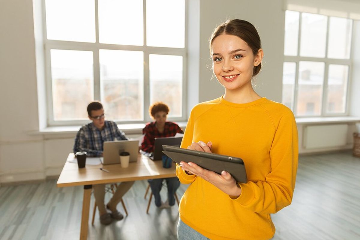 Smiling woman leader at work