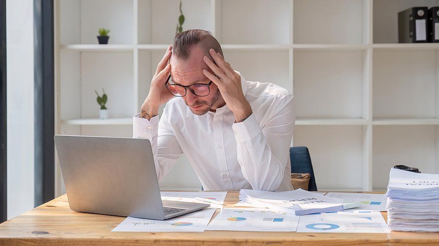 Stressed man tries to get out of a career he hates