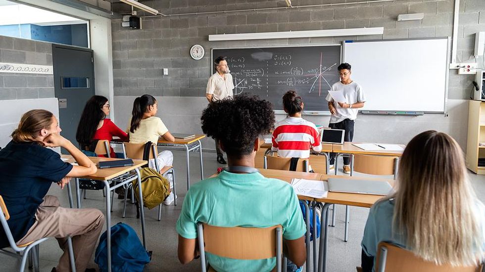 Student gives a presentation during class