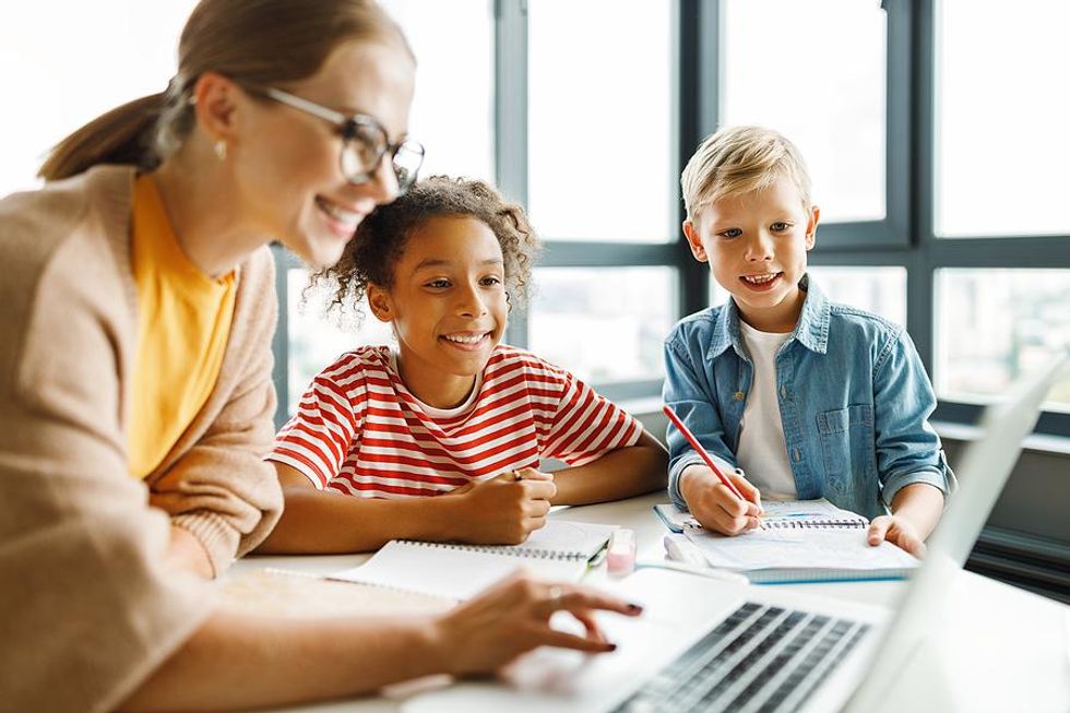 Teacher educates her students on technology