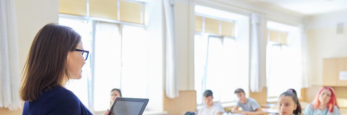 Teacher lectures her students