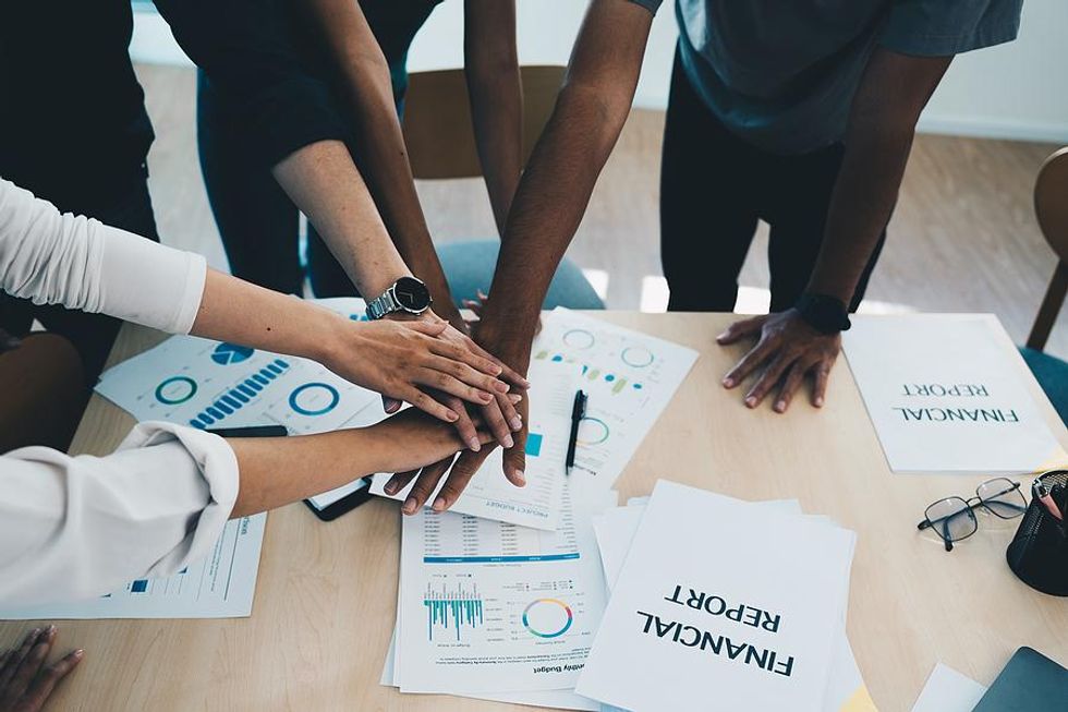 Team members work on a project together