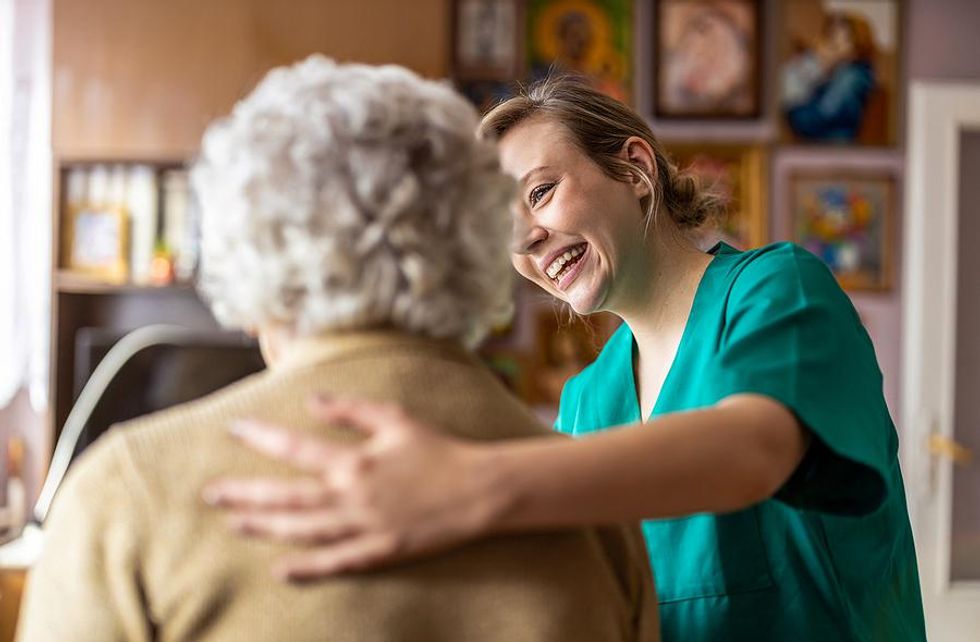 Traveling nurse helps an elderly patient