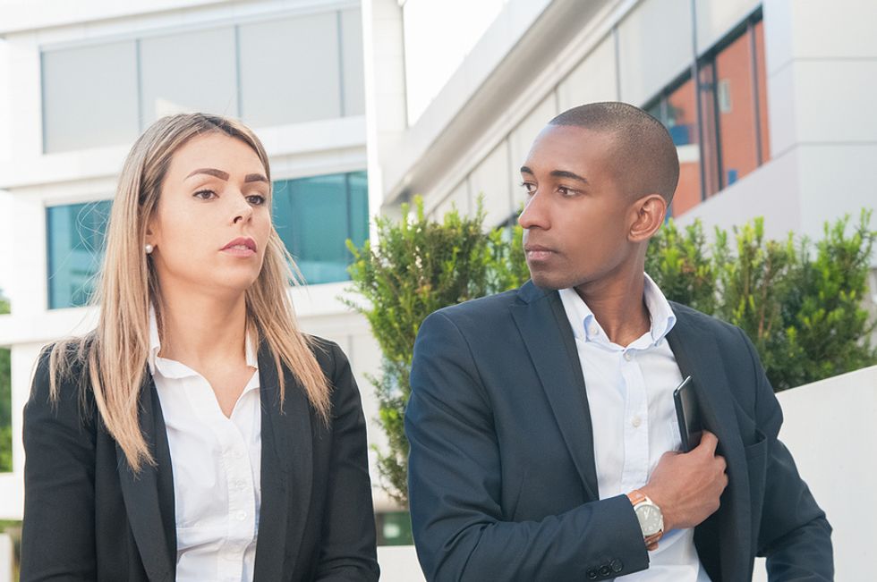 Two co-workers have a conversation about microaggressions