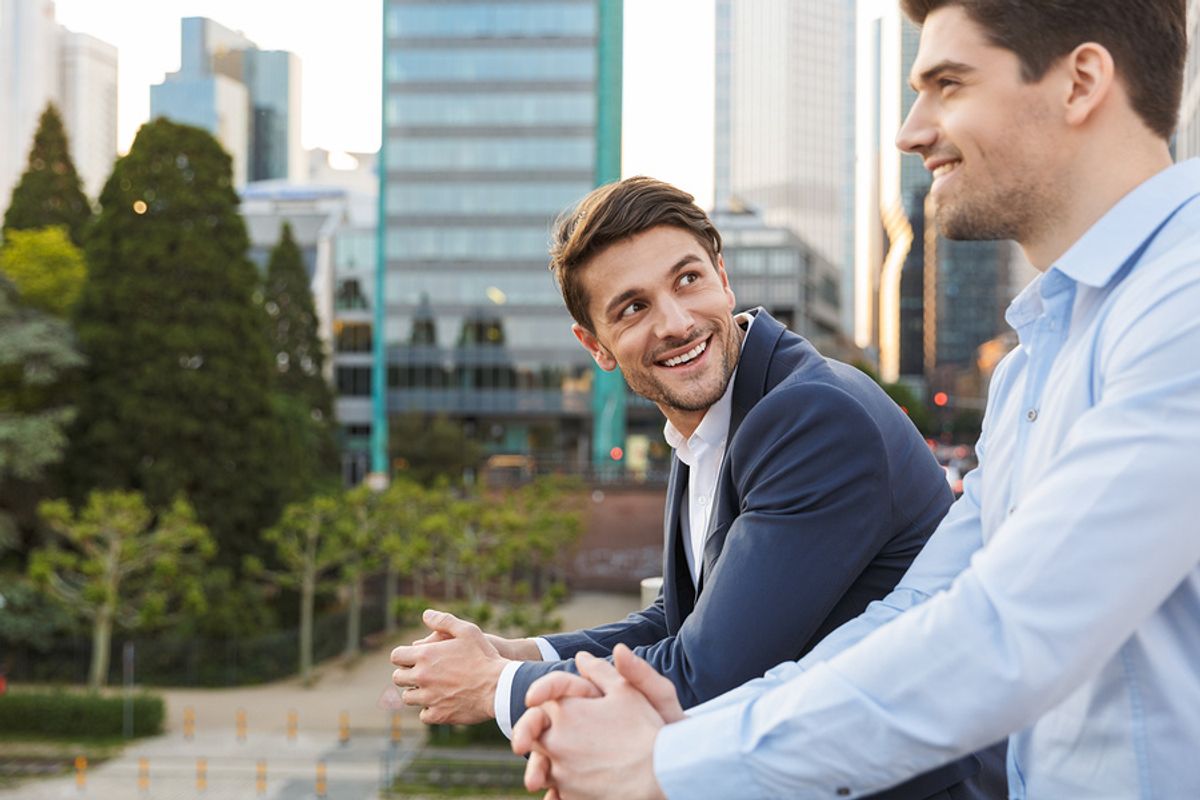 Two co-workers with good communication skills