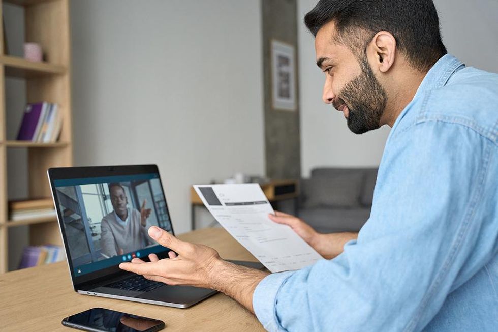 Two hiring managers discuss an internal job candidate