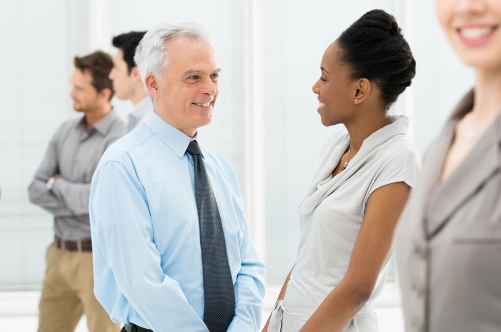 Two professional meet at a networking event