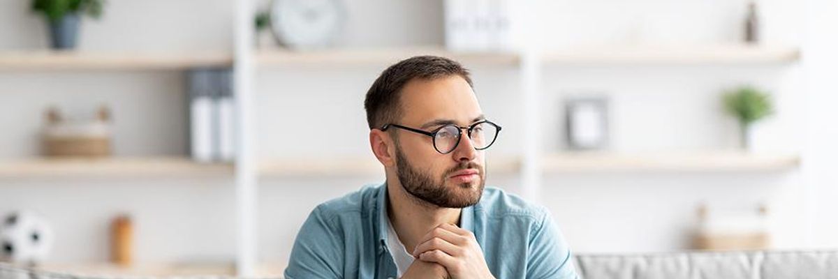 Unemployed man thinks about what to do