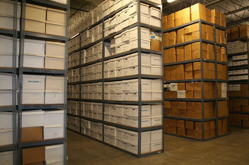 Warehouse full of paper documents, files, and papers