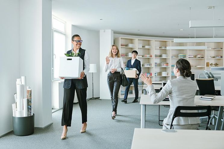 https://www.workitdaily.com/media-library/well-dressed-professionals-moving-to-a-new-office.jpg?id=25872708&width=744&quality=85