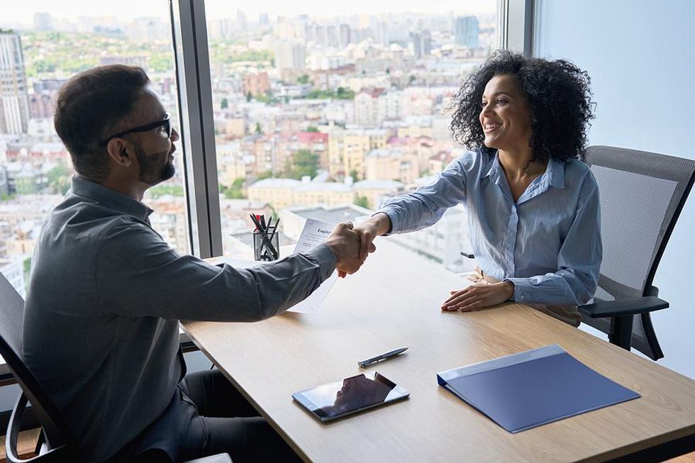 Woman accepts a job offer after an interview