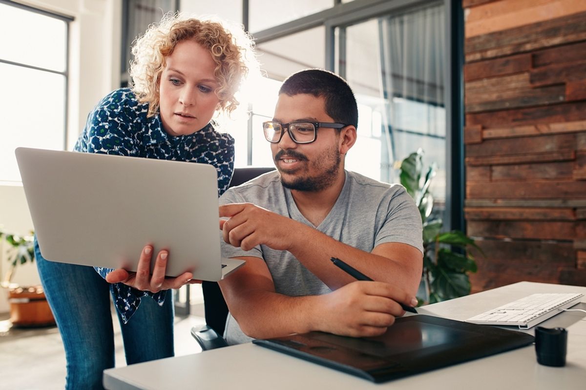 Woman accepts her coworker's criticism of her work