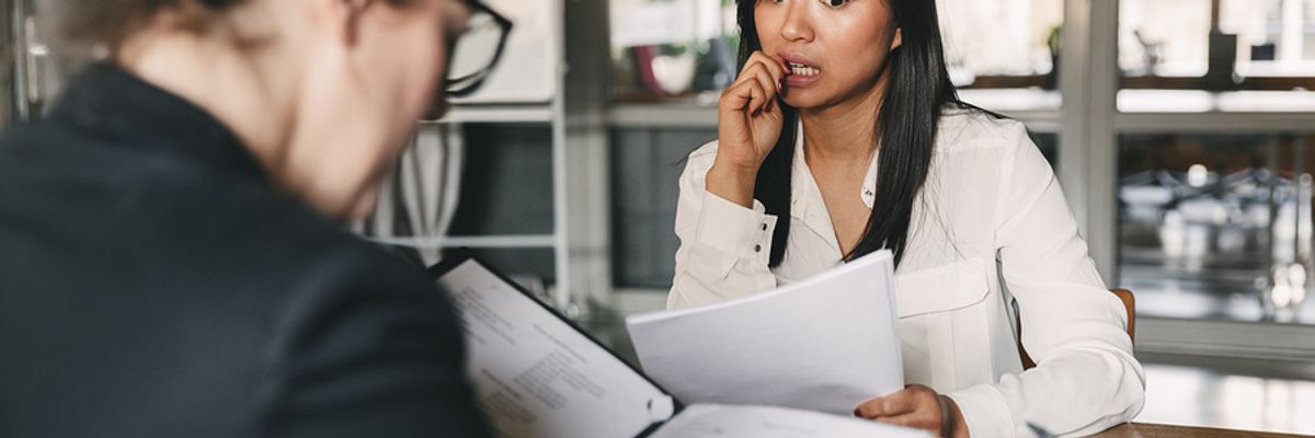 Woman addressing incomplete degree on resume during an interview