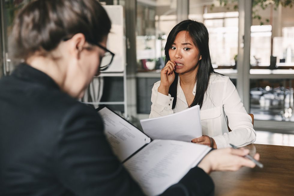 Woman addressing incomplete degree on resume during an interview