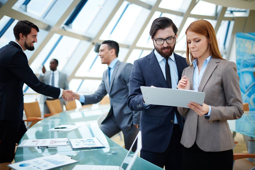 Woman and man attend a job fair