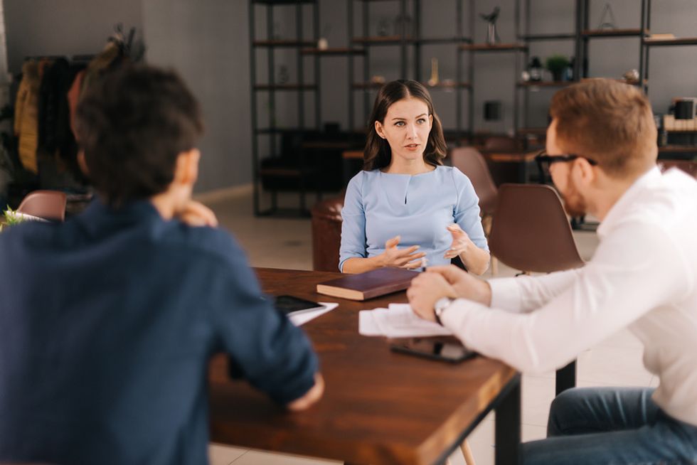 Woman answers a question during a group interview